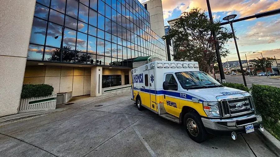 Huntsville Emergency Medical Services Inc. (HEMSI) ambulance parked in front of Huntsville Hospital