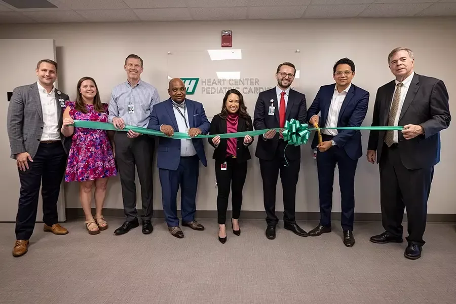 Huntsville Hospital leadership, pediatric cardiologists and Huntsville's Mayor Battle cut the ribbon on the new Heart Center Pediatric Cardiology office.