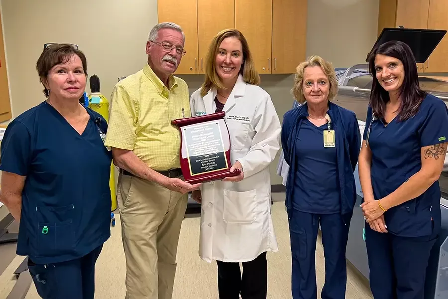 Patient Kyle Pankey and some of the Huntsville Hospital Wound Care Center team