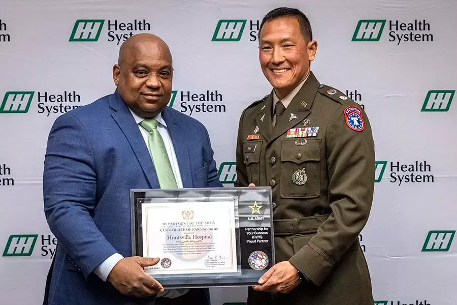 Pictured are HH President and Chief Operating Officer Tracy Doughty (left) and 2nd Medical Recruiting Battalion Commander Lt. Col. Jason S. Kim (right)