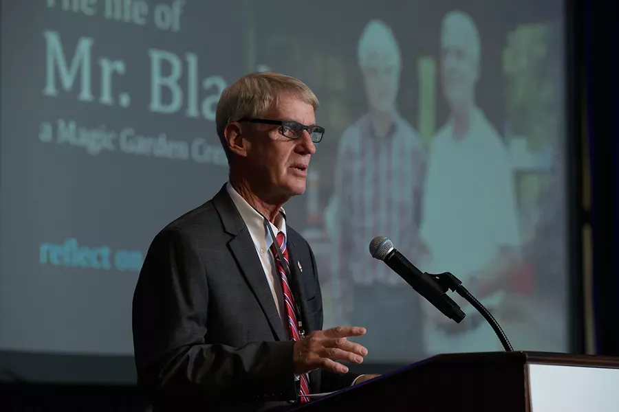 Robert Black speaks at the podium after receiving the Samuel Ullman Award