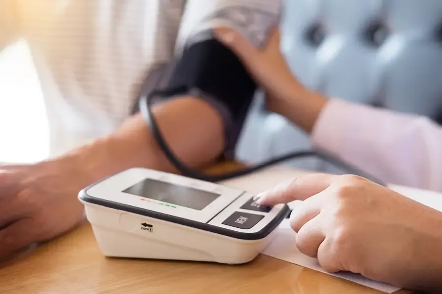 Photo of someone monitoring blood pressure