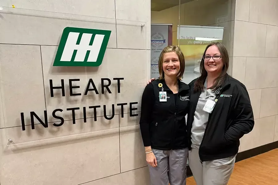 Christy Cantey and Meghan Dunning, who both work for The Heart Center's Structural Heart Program, pose for a photo.